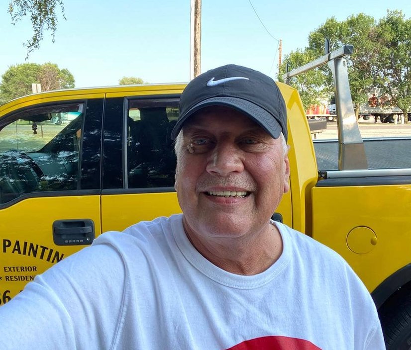 Owner in front of truck